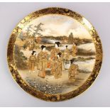 A GOOD JAPANESE MEIJI PERIOD SATSUMA PLATE, decorated with scenes of females in a landscape