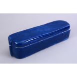 A GOOD TURKISH KUTAHYA PORCELAIN PEN BOX, with a blue grorund, the interior with formal floral