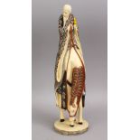 THREE CHINESE IVORY & IVORY LIKE POLYCHROME DECORATED FIGURES , one of a figure upon horseback, 34cm