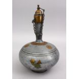 A 19TH CENTURY INDIAN BRASS INLAID PEWTER DRINKING FLASK " SURAHI", 29cm.