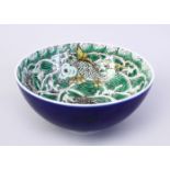 AN 18TH CENTURY KANGXI PERIOD CHINESE FAMILLE VERTE & POWDER BLUE FISH & CRAB BOWL, the interior