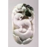 A CHINESE CARVED JADIEITE PENDANT OF A TIGER AND MONEY IN A LANDSCAPE, 8.5CM.