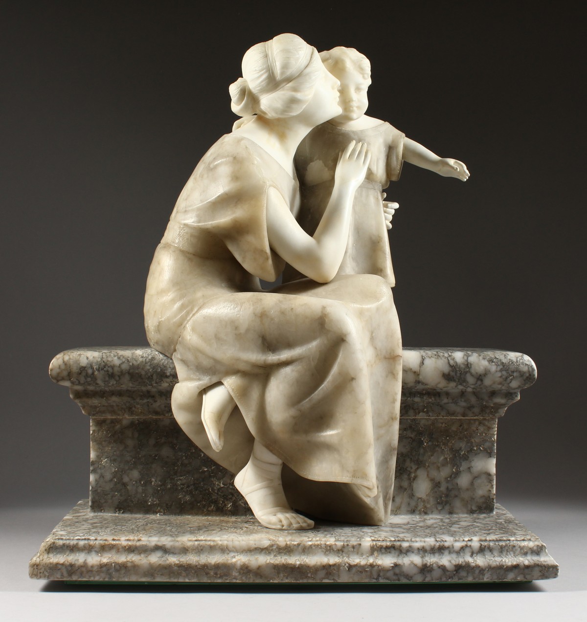 A VERY GOOD LATE 19TH CENTURY ALABASTER GROUP, well carved from three colours of stone depicting a