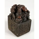 A LARGE CHINESE SQUARE SHAPE DRAGON SEAL. 5.5ins high.