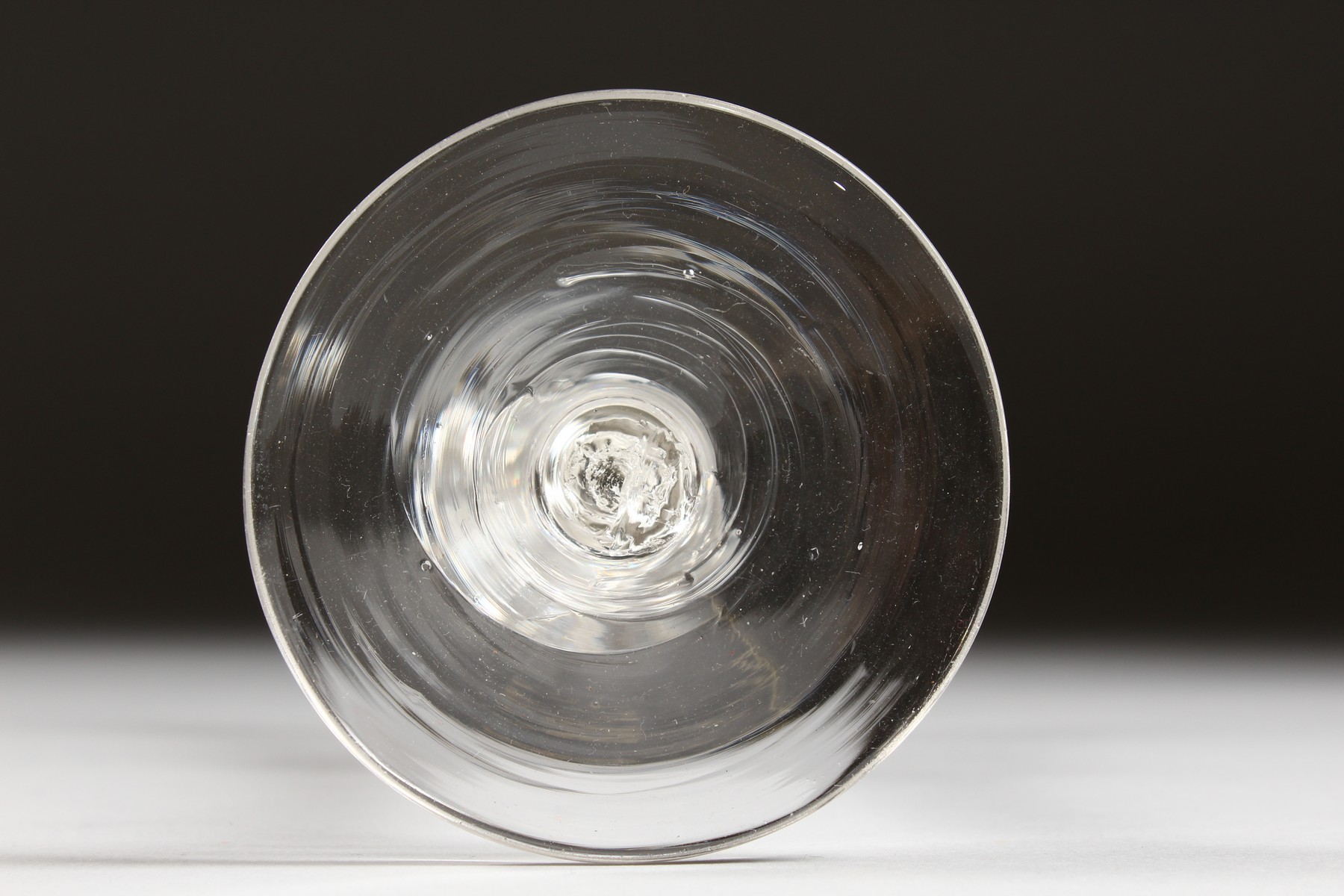 A GEORGIAN WINE GLASS with inverted bell shaped bowl and air twist stem. 6.5ins high. - Image 4 of 4
