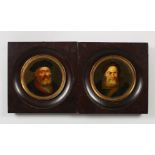 A PAIR OF CONTINENTAL PORTRAIT BUSTS BEARDED GENTLEMEN, oil on board, circular, in ebony frames.