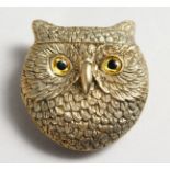 A GILDED OWL VESTA.