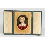 A GOOD PORCELAIN OVAL MINIATURE OF A LADY in a folding leather case. 4.25ins x 3ins.