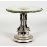 A SUPERB RUSSIAN SILVER CENTREPIECE / TAZZA with circular glass top, 9.5ins diameter. The stand with