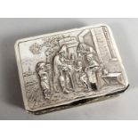 A DUTCH SILVER SNUFF BOX, the lid repousse with an old man selling toys. 3.75ins long.