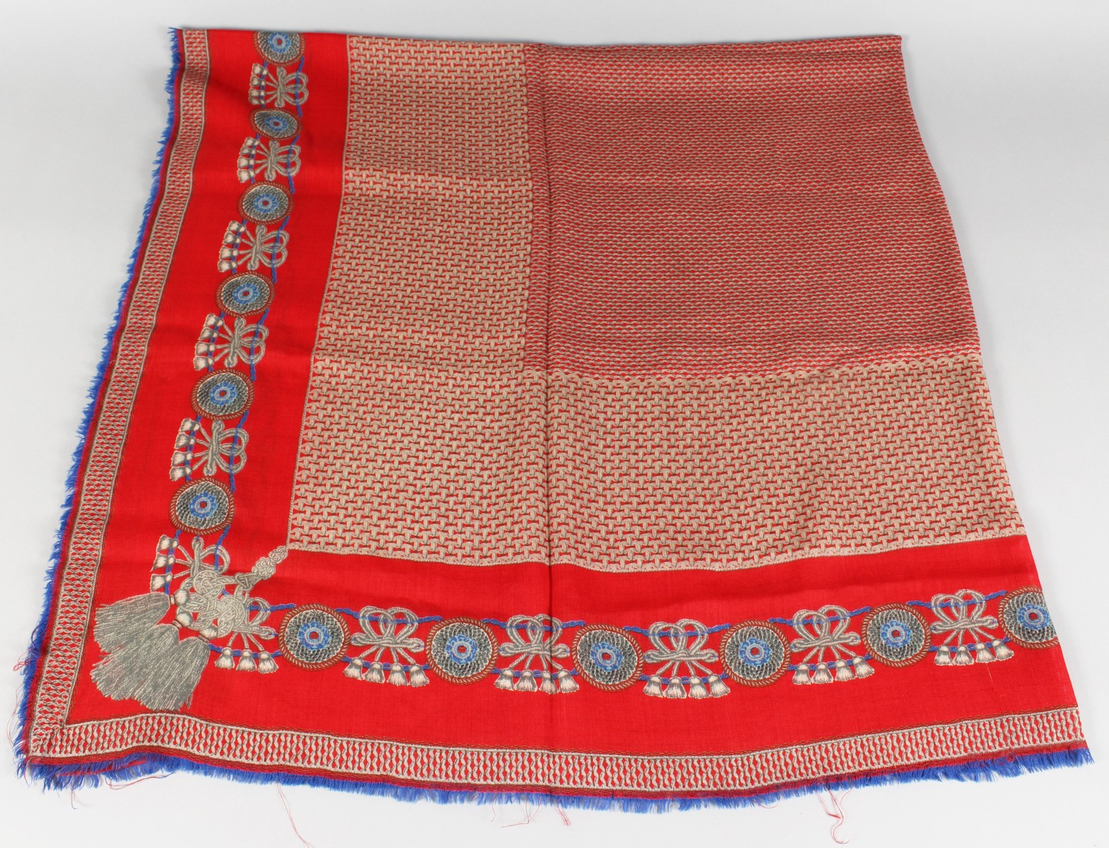 A VINTAGE CHANEL SILK SCARF, RED AND BLUE WITH TASSELS.