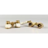 A GOOD PAIR OF MOTHER-OF-PEARL OPERA GLASSES with handles. (2)