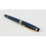 A BLUE MONT BLANC PEN.