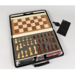 A BUGATTI LEATHER CASED CHESS SET.