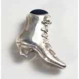 A SILVER VICTORIAN BOOT PIN CUSHION.