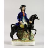 A STAFFORDSHIRE FIGURE DICK TURPIN. 11.5ins high.