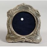 A SILVER ART NOUVEAU STYLE PHOTOGRAPH FRAME. 6ins x 5.25ins.