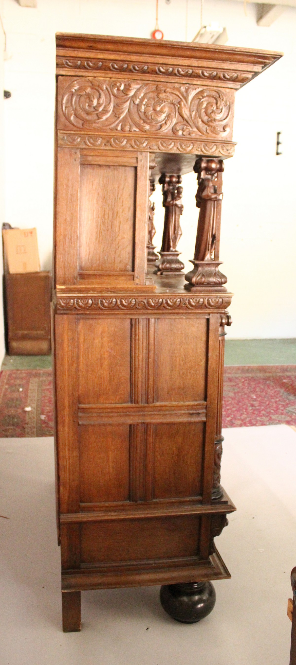 A GOOD 17TH CENTURY FLEMISH OAK CUPBOARD, with carved cornice and frieze, carved with a vase and - Image 14 of 16