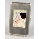 A LARGE ENGINE TURNED SILVER CIGARETTE CASE with an oval enamel plaque GLAMOUR. Birmingham 1950,