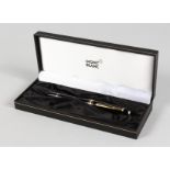 A MONT BLANC PEN in a box.
