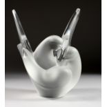 A MODERN LALIQUE GLASS VASE, modelled as a dove with wings outswept. 8ins high.
