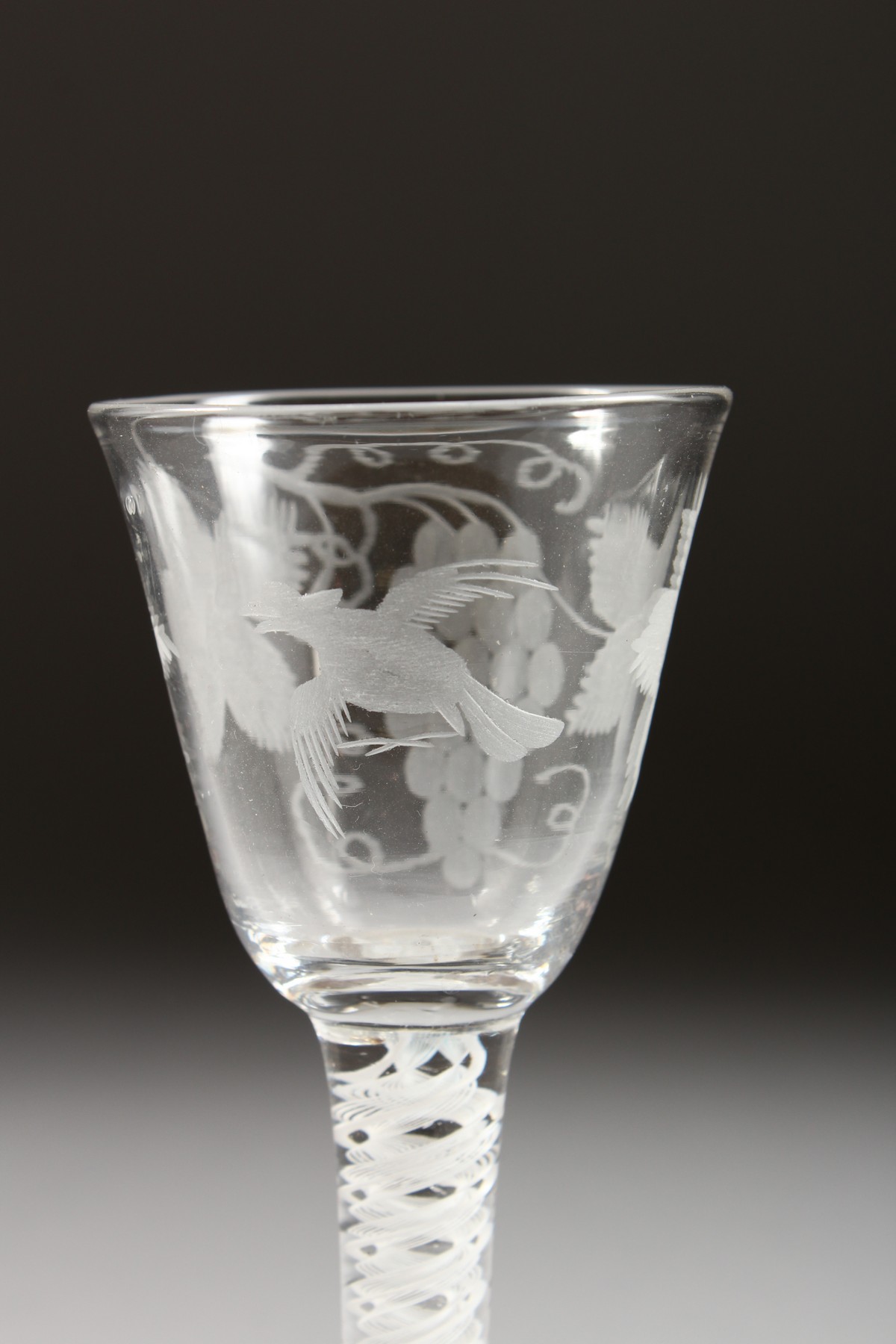 A GEORGIAN WINE GLASS, the bowl engraved with fruiting vines with white twist stem. 5.25ins high. - Image 4 of 7