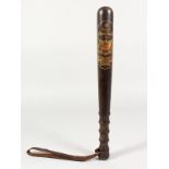 A TRUNCHEON - "MANCHESTER SPECIAL CONSTABLE P. LOMAS 1914-1919" with turned finger grip and