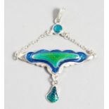 A SILVER AND ENAMEL ART NOUVEAU STYLE PENDANT. 1.75ins wide.