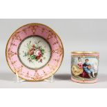 A GOOD 18TH CENTURY SEVRES PINK GROUND CUP AND SAUCER, the cup painted with a boy with guitar, a