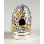 A NOVELTY SILVER BEEHIVE PIN CUSHION.