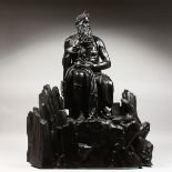 AFTER MICHELANGELO - AN IMPRESSIVE LARGE BRONZE OF MOSES seated on rocks, a tablet under his arm.