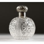 A SILVER MOUNTED CUT GLASS SCENT BOTTLE, Chester 1907. 6ins high.