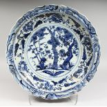 A LARGE CHINESE BLUE AND WHITE PORCELAIN DISH. 18ins diameter.