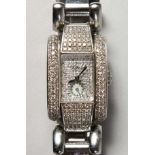 A SUPERB DIAMOND SET CHOPARD WRISTWATCH No. 41/8380 1093723 8357, in a Chopard box.