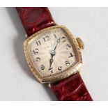 A LADIES' 9CT GOLD ROLEX WRISTWATCH No. 11883, with leather strap.