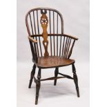 A 19TH CENTURY ASH AND ELM WHEEL BACK ARMCHAIR. 3ft 5ins high x 1ft 9ins wide.