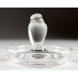 A LALIQUE BIRD CIRCULAR RING STAND. 3ins high.