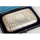 A GOOD VICTORIAN ENGRAVED SILVER CIGAR CASE in a blue case. Birmingham 1886. Maker C. C.