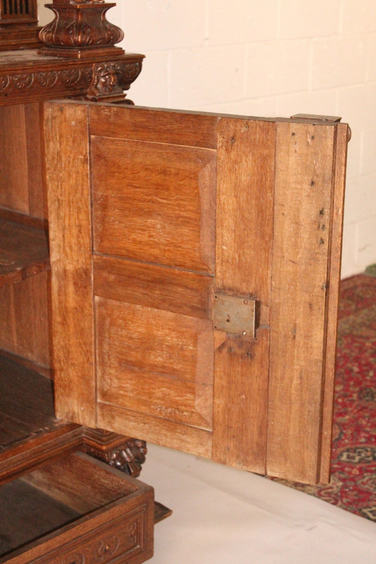 A GOOD 17TH CENTURY FLEMISH OAK CUPBOARD, with carved cornice and frieze, carved with a vase and - Image 12 of 16