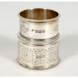 TWO ENGRAVED SERVIETTE RINGS. Sheffield 1914.