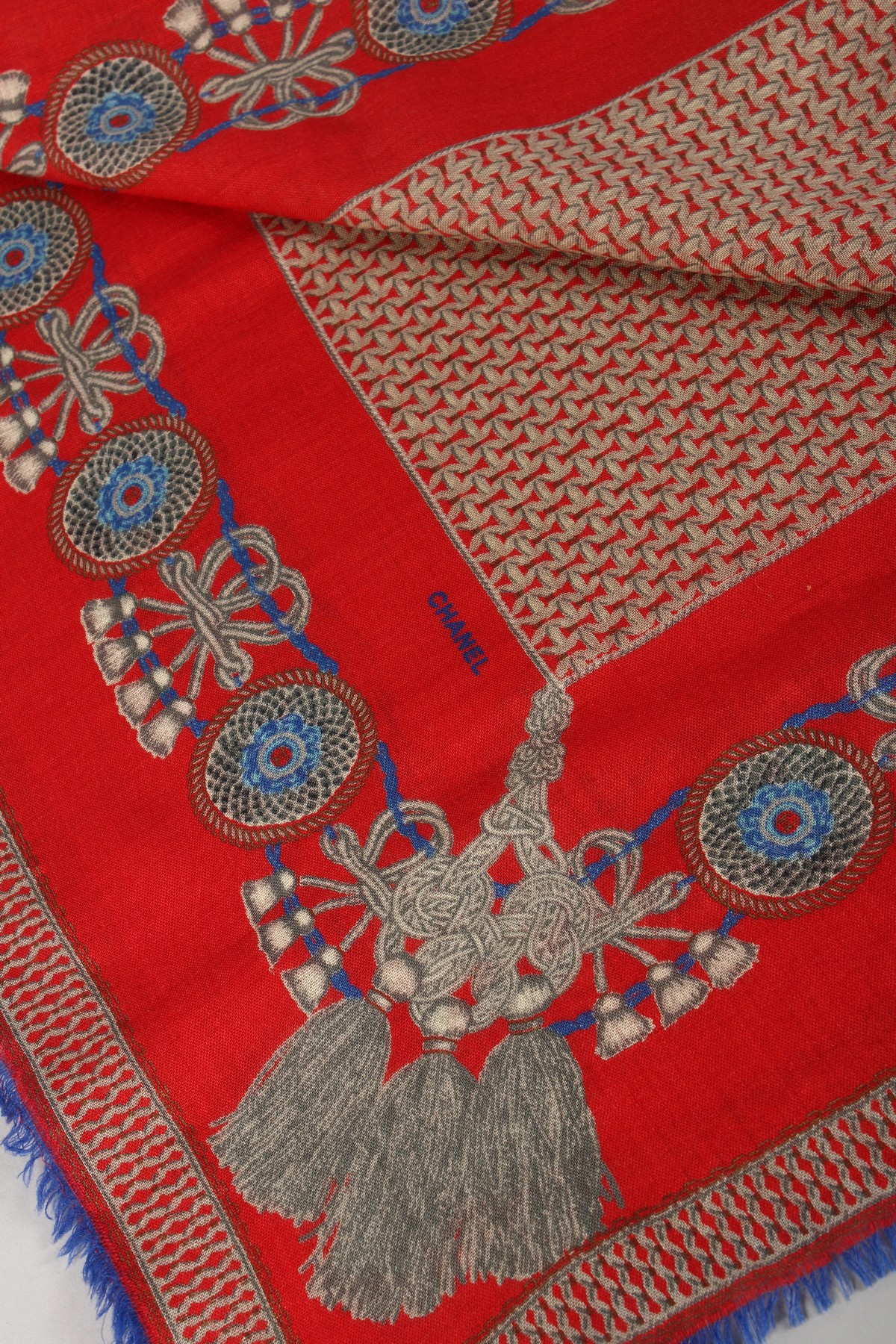 A VINTAGE CHANEL SILK SCARF, RED AND BLUE WITH TASSELS. - Image 2 of 2