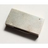 A REEDED SILVER SNUFF BOX. Birmingham 1954.