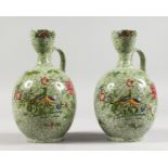 TWO COPELAND SPODE BOTTLE VASES, green leaf decorated ground with exotic birds (AF). 8.5ins high.