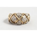 A 9CT YELLOW GOLD DIAMOND COSS HATCH RING.