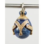 A RUSSIAN LAPIS LAZULI AND SILVER EGG SHAPE PENDANT.