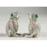 A PAIR OF .925 SILVER PLATE GREEN EYED FROG SALT AND PEPPERS.