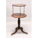 A GOOD REGENCY MAHOGANY CIRCULAR TWO TIER DUMB WAITER with turned brass column supports, the base