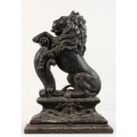 A GEORGIAN RAMPANT LION DOOR STOP. 15ins high.