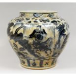 A CHINESE BLUE AND WHITE DECORATED PORCELAIN JARDINIERE. 12ins high.