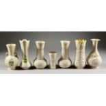 SEVEN VARIOUS IRISH BELLEEK VASES.